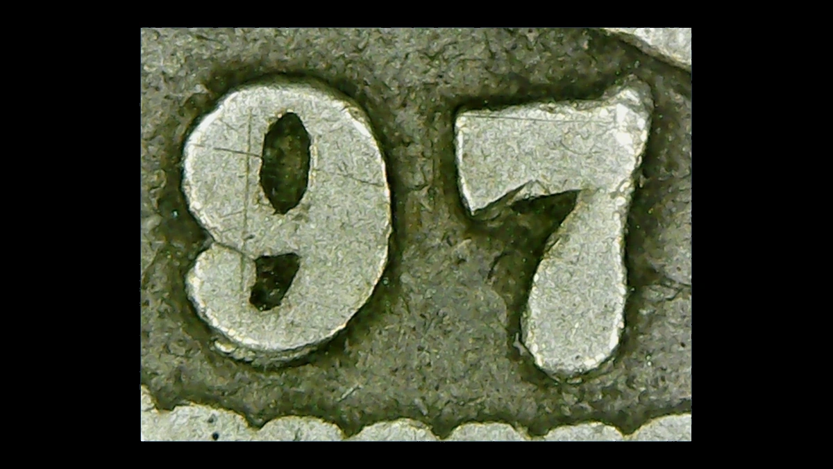 1897 Barber Half Dollar: Repunched Date