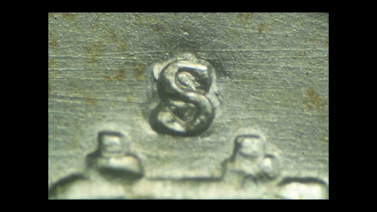 1953 Franklin Half Dollar: Repunched Mintmark