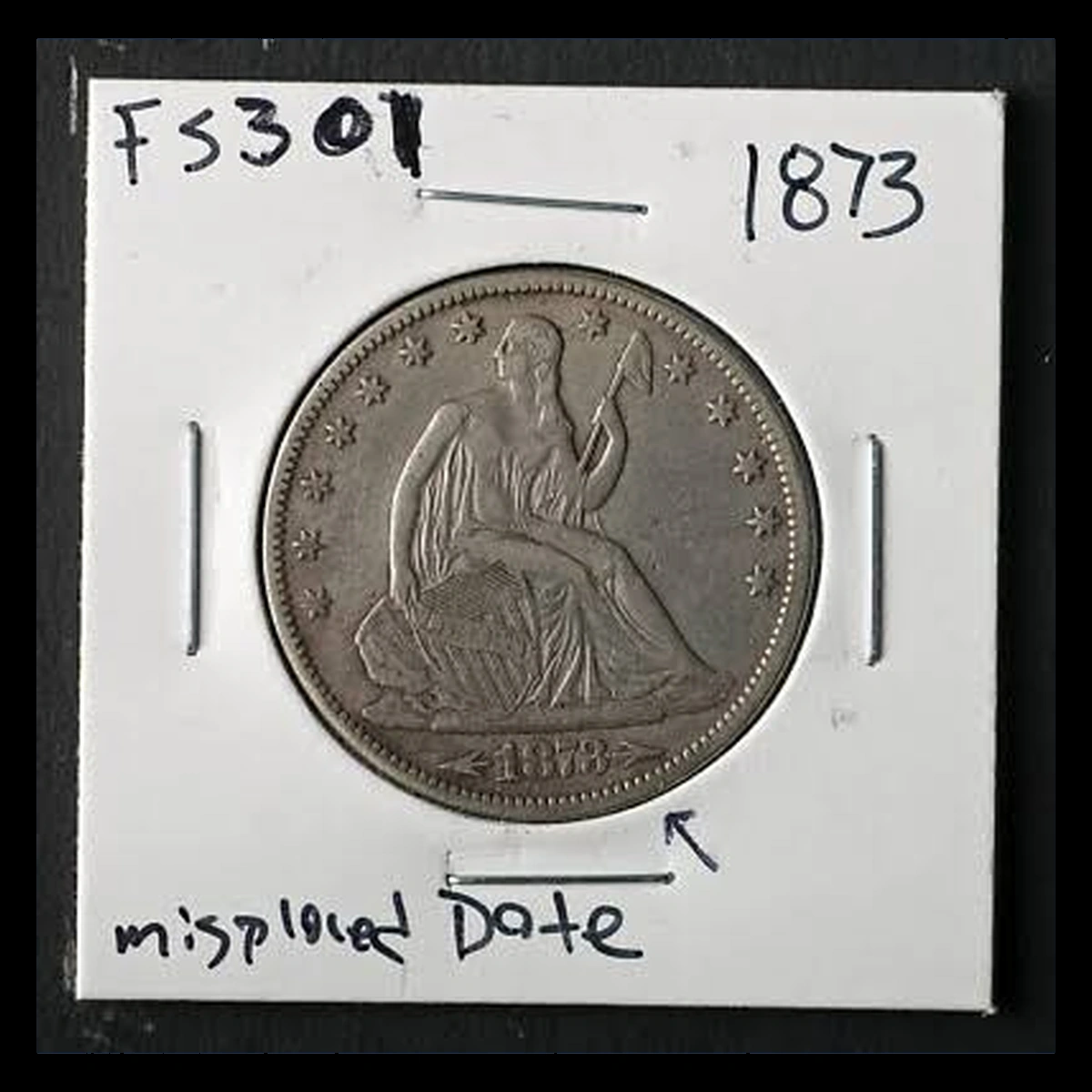 1873 Liberty Seated Half Dollar: Misplaced Date