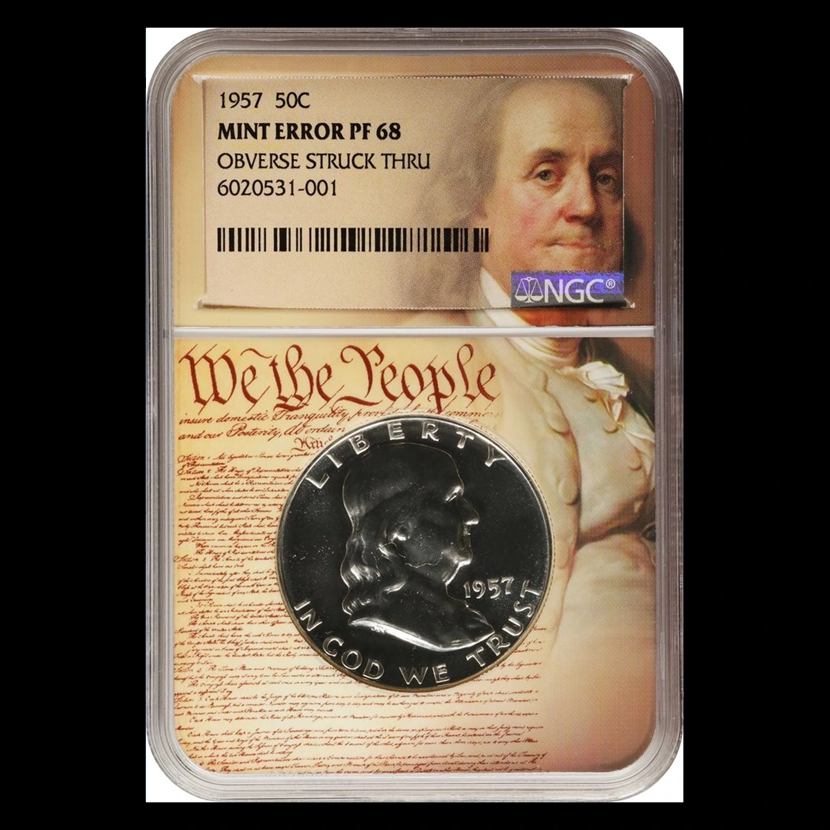 1957 Franklin Half Dollar: obverse strike-through