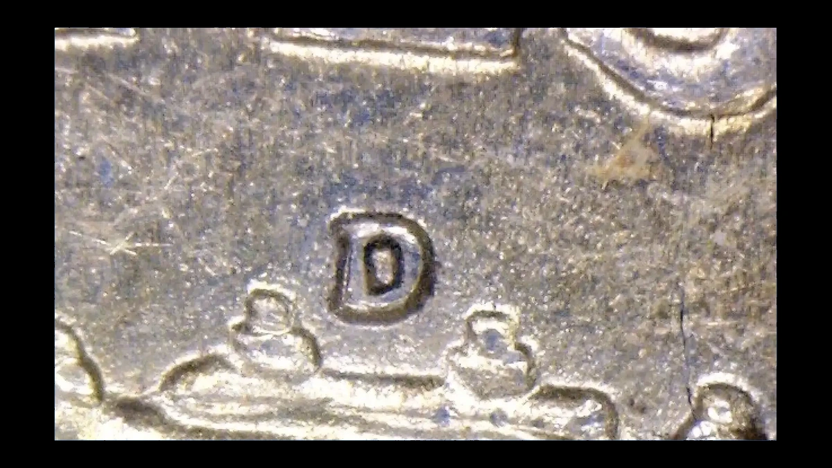 1950 Franklin Half Dollar: Repunched Mintmark