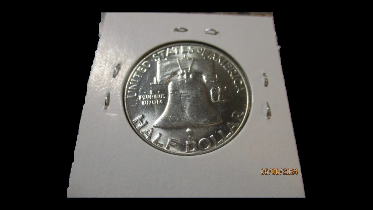 1958 Franklin Half Dollar: Repunched Mintmark