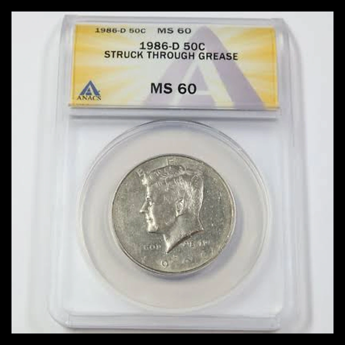 1986 Kennedy Half Dollar: Struck-Through Error