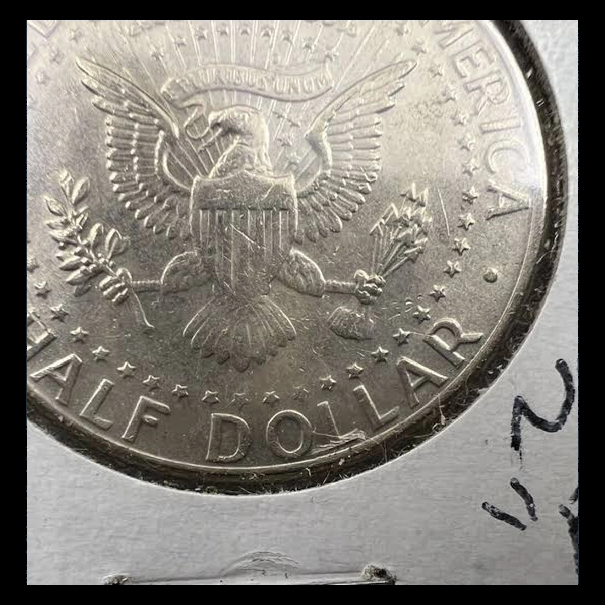 1990 Kennedy Half Dollar: Missing FG Initials