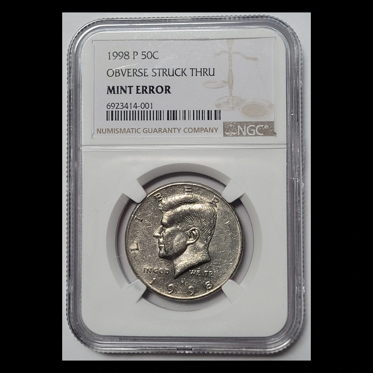 1998 Kennedy Half Dollar: obverse strike-through