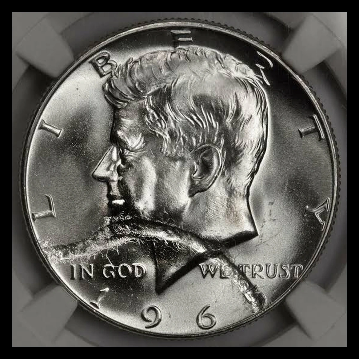 1965 Kennedy Half Dollar: Struck Through