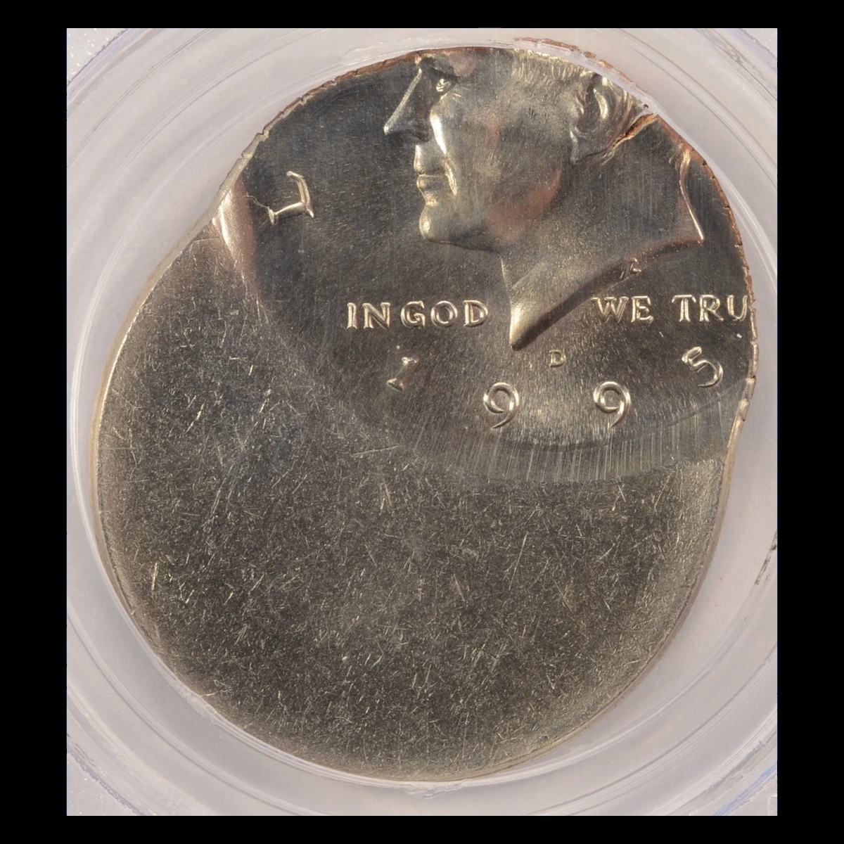 1995 Kennedy Half Dollar: Off-Center Strike