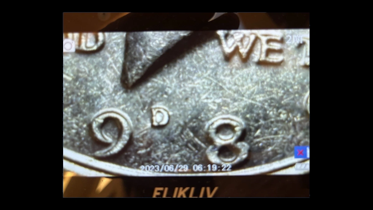 1989 Kennedy Half Dollar: Repunched Mintmark
