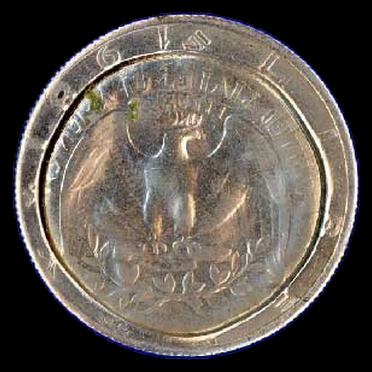 1981 Kennedy Half Dollar: quarter-reverse brockage