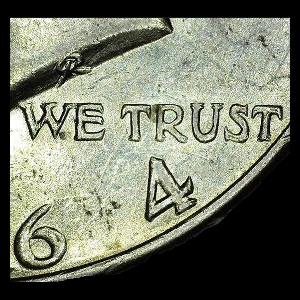 1964-D Kennedy half dollar: lettering on a seller-attributed doubled-die example