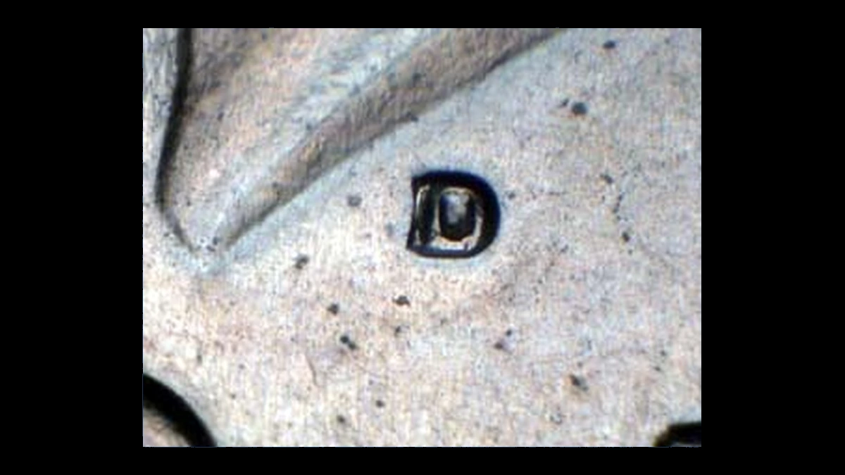 1971 Kennedy Half Dollar: Repunched Mintmark