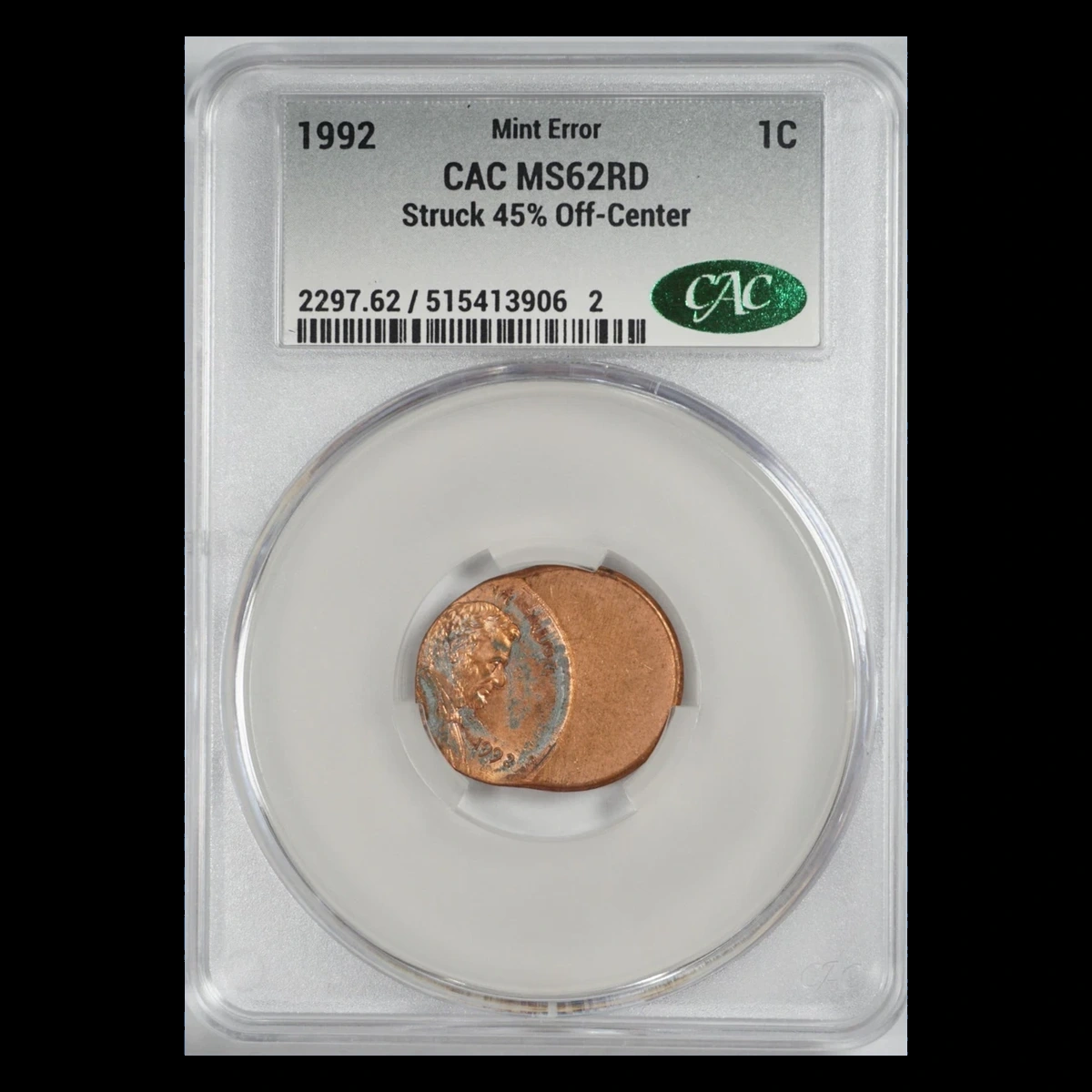 1992 Lincoln Penny: struck 45 percent off center, holder and enlarged coin
