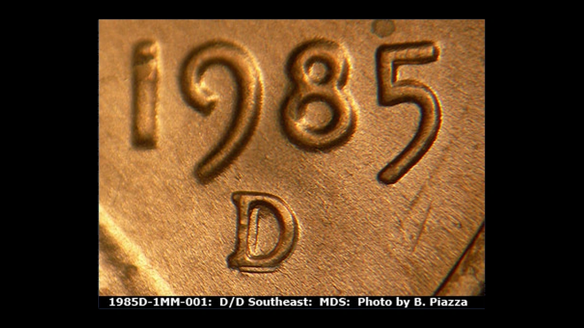 1985 Lincoln Penny: Repunched Mintmark