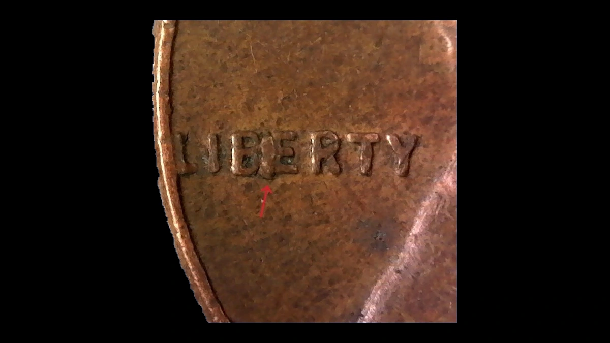 1957 Wheat Penny: BIE Die Break