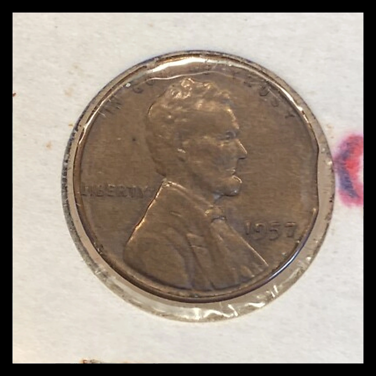 1957 Wheat Penny: Clipped Planchet
