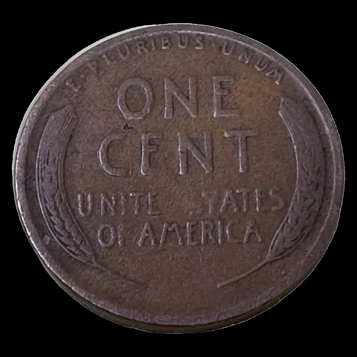 1928 Wheat Penny: Struck-Through Error