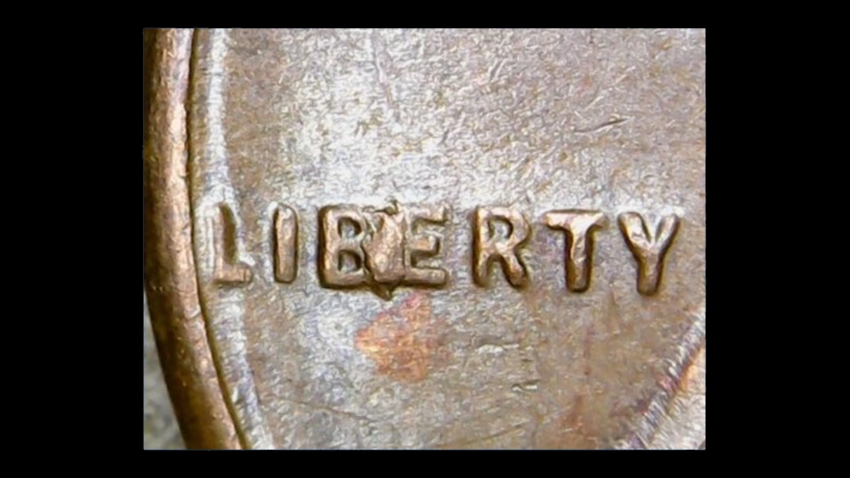 1954 Wheat Penny: BIE Die Break