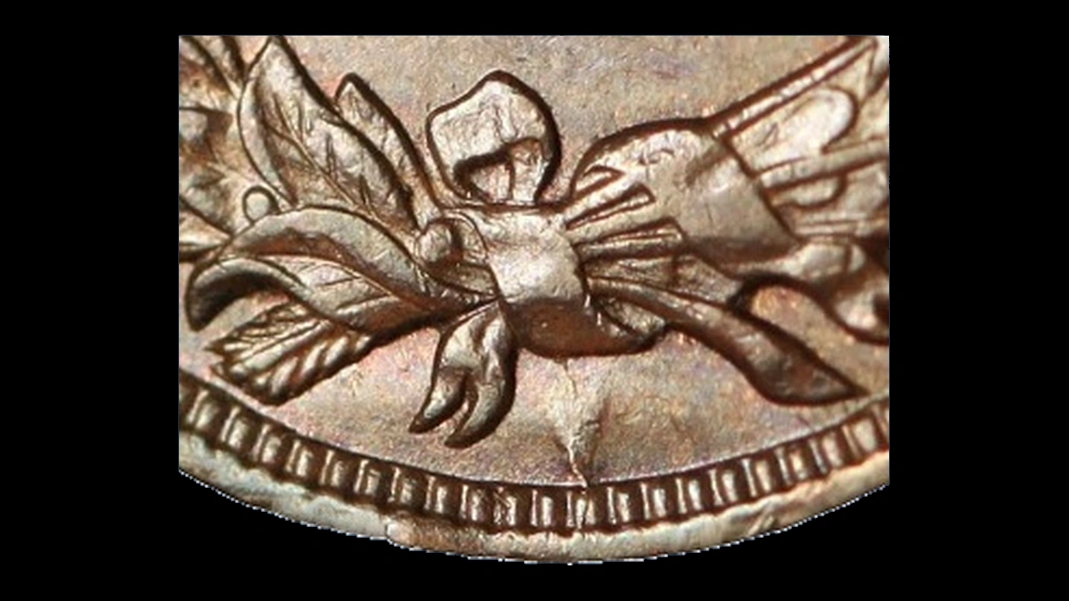 1908 Indian Cent: die sinking between the arrow and wreath