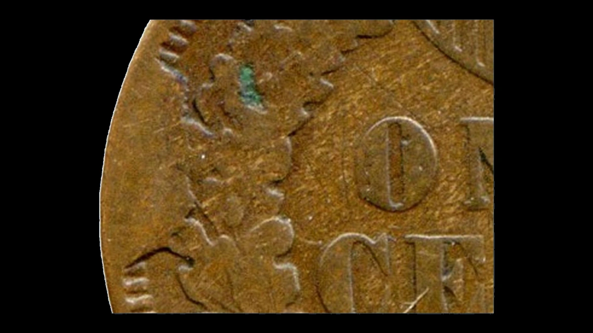 1874 Indian Head Penny: Die Break / Cud