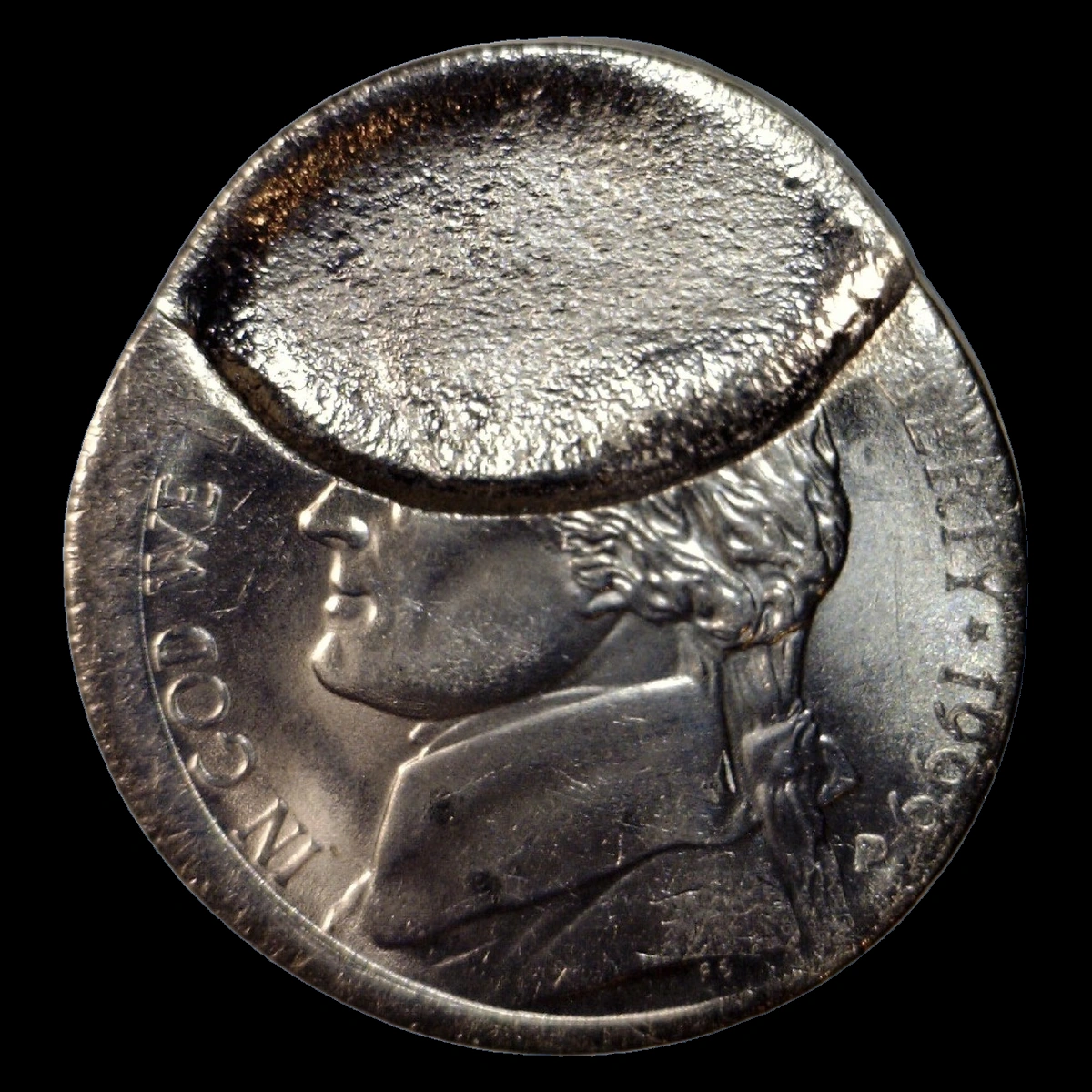 1999 Jefferson Nickel: indent from an overlapping blank