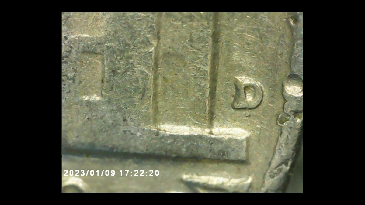 1959 Jefferson Nickel: Repunched Mintmark