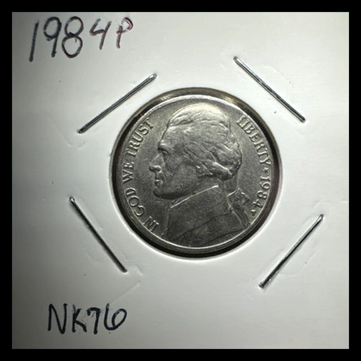 1984 Jefferson Nickel: die clash through the neck and fields