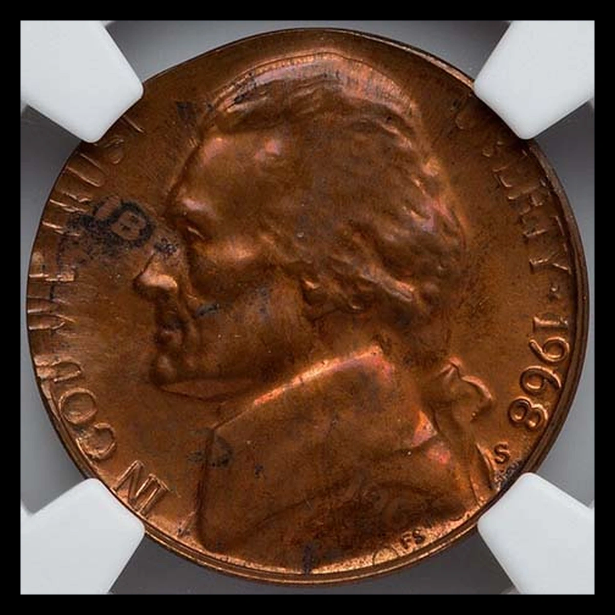 1968 Jefferson Nickel: Nickel struck over a struck cent