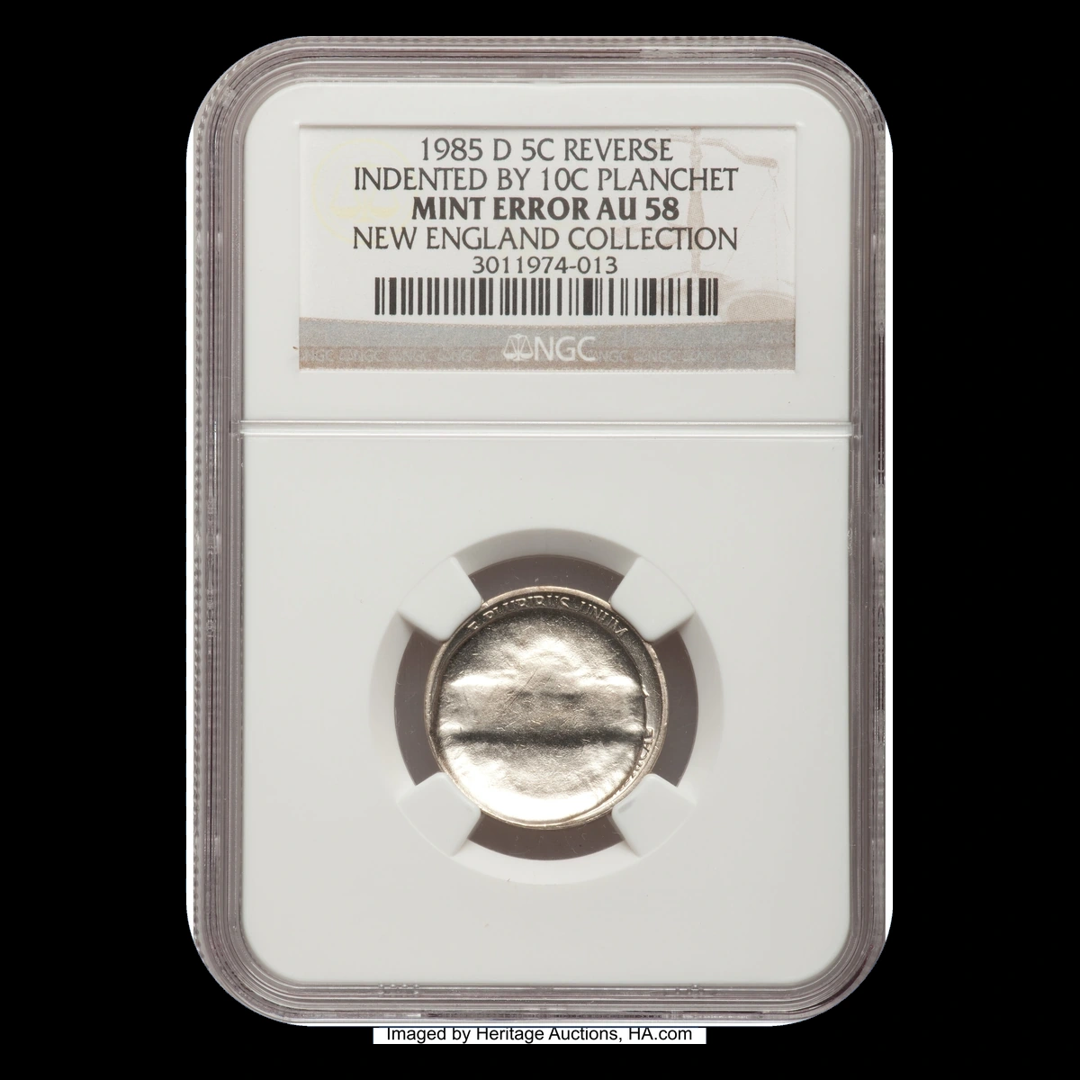 1985 Jefferson Nickel: Indented by dime blank