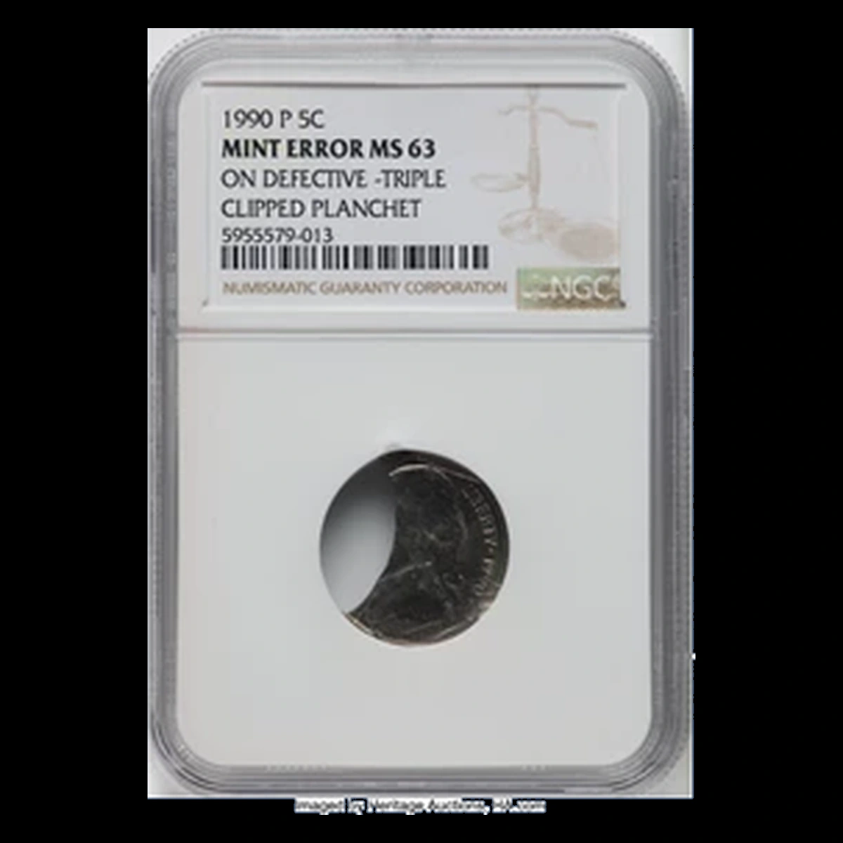 1990 Jefferson Nickel: Defective triple-clipped blank