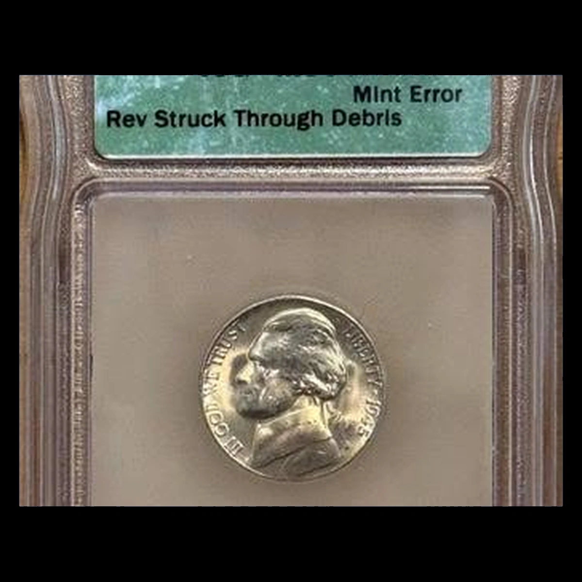1945 Jefferson Nickel: Struck Through
