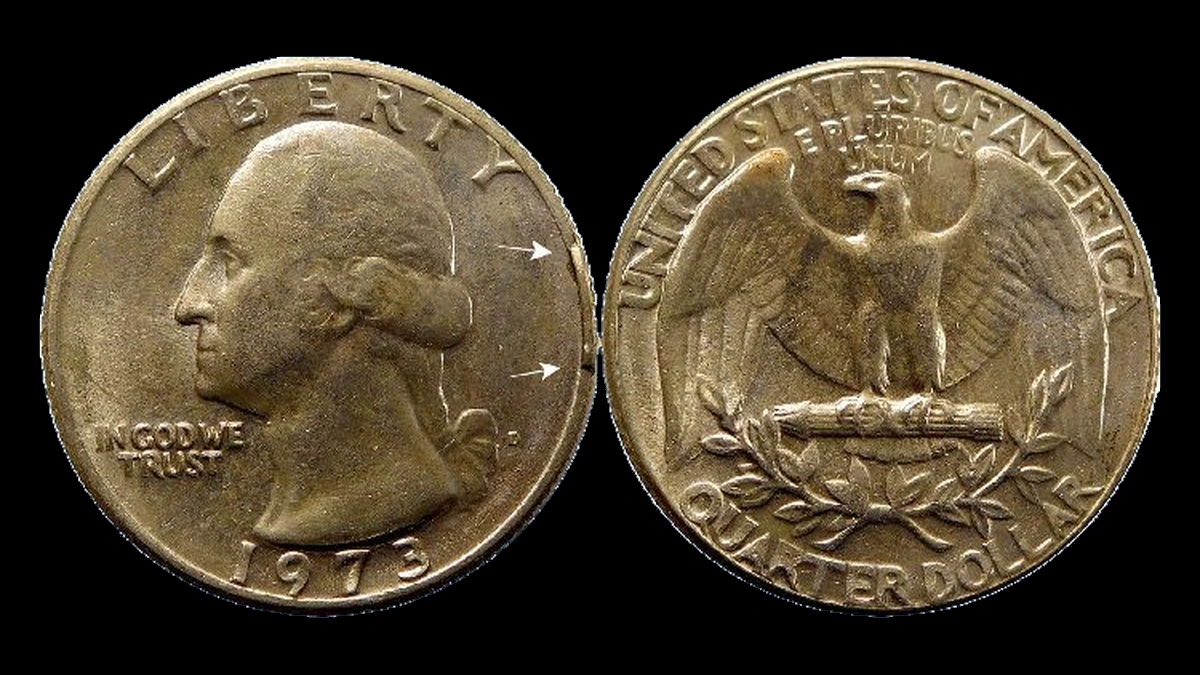 1973 Washington Quarter: rim cud