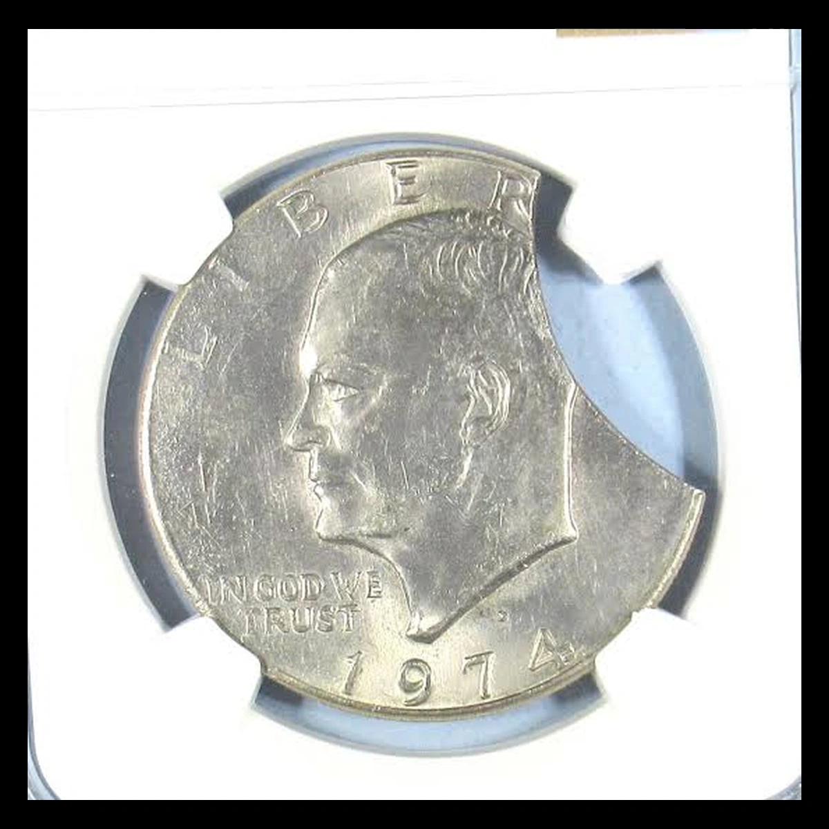 1974 Ike Dollar: Clipped Planchet