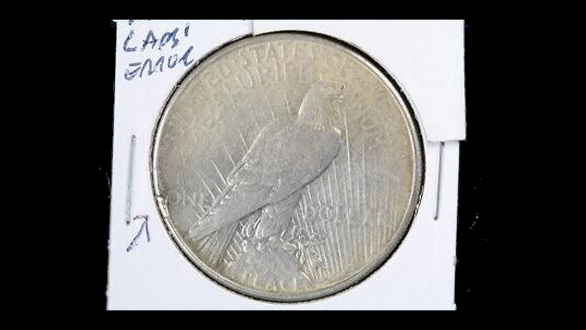 1935 Peace Silver Dollar: Lamination / Split Planchet