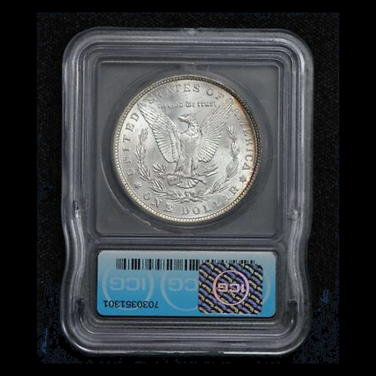1887 Morgan Dollar: strike-through