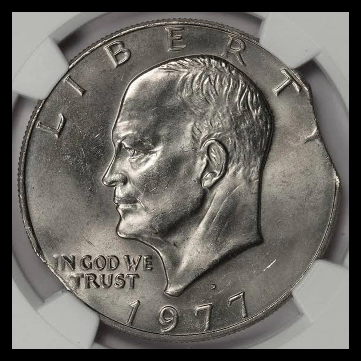 1977 Eisenhower Dollar: Double Curved Clips