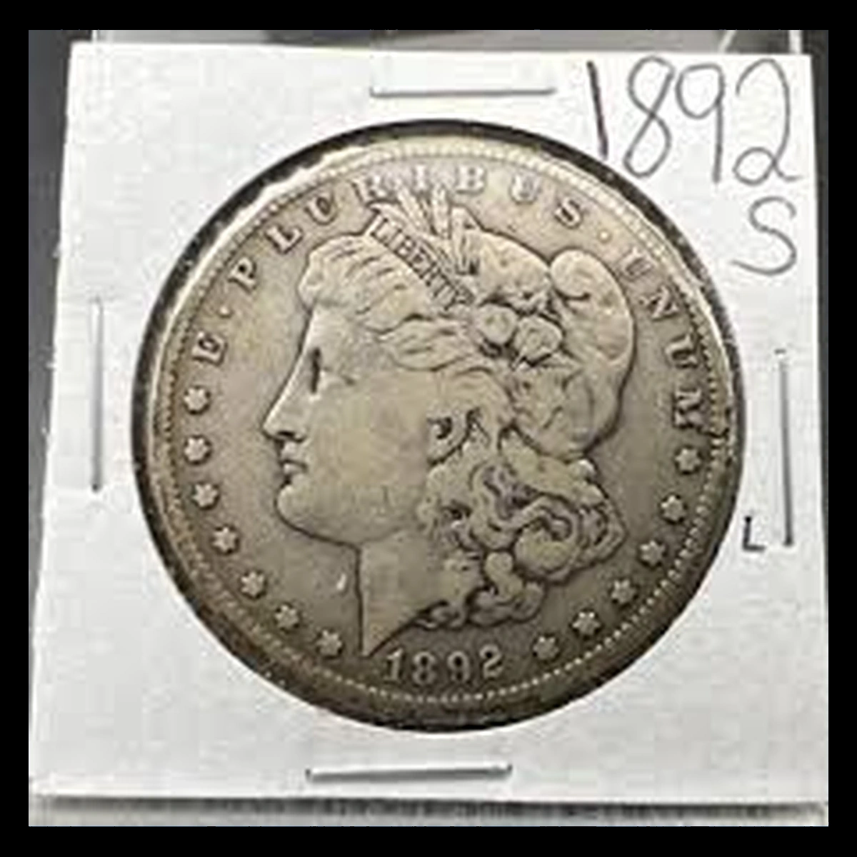 1892 Morgan Silver Dollar: Lamination / Split Planchet