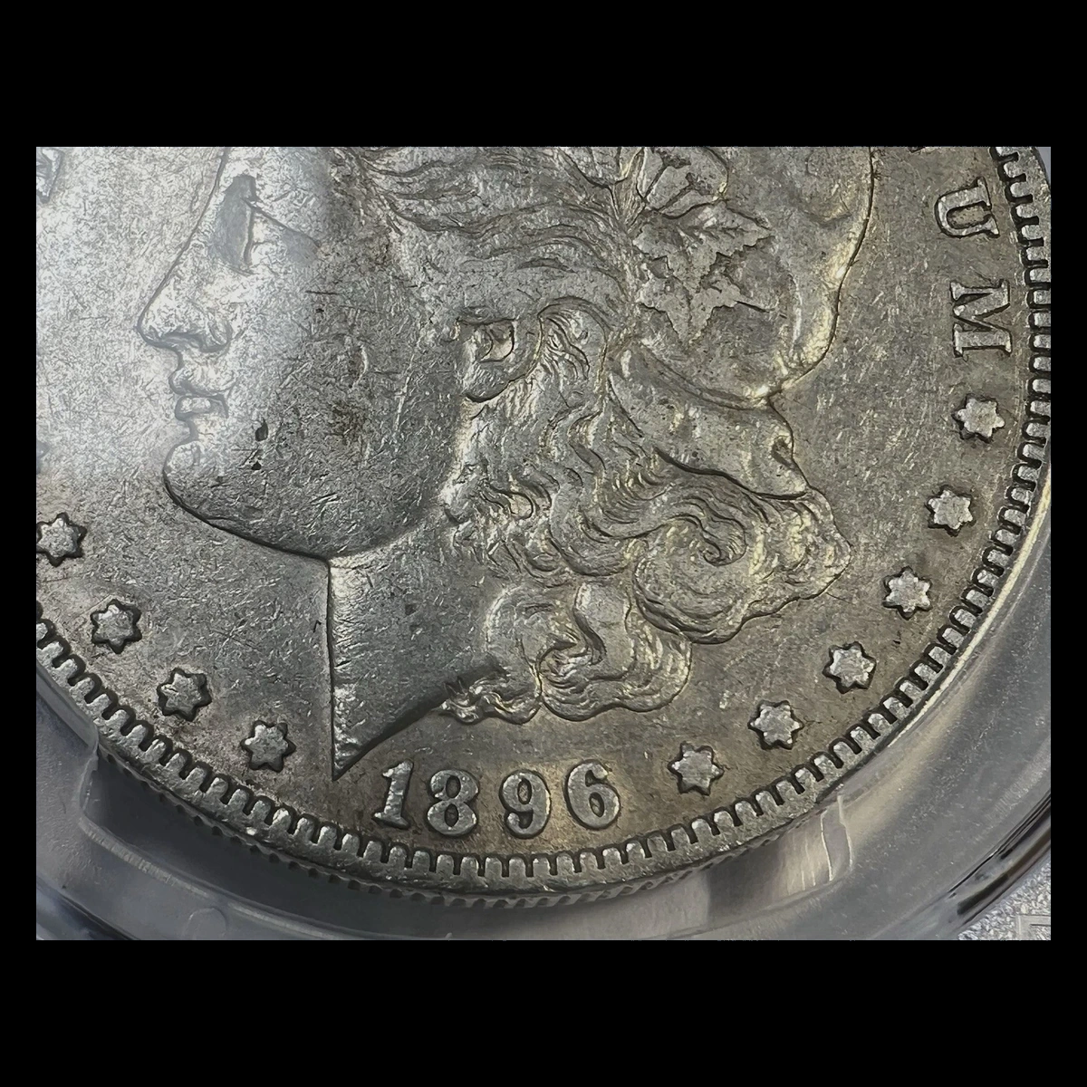 1896 Morgan Dollar: Repunched Date