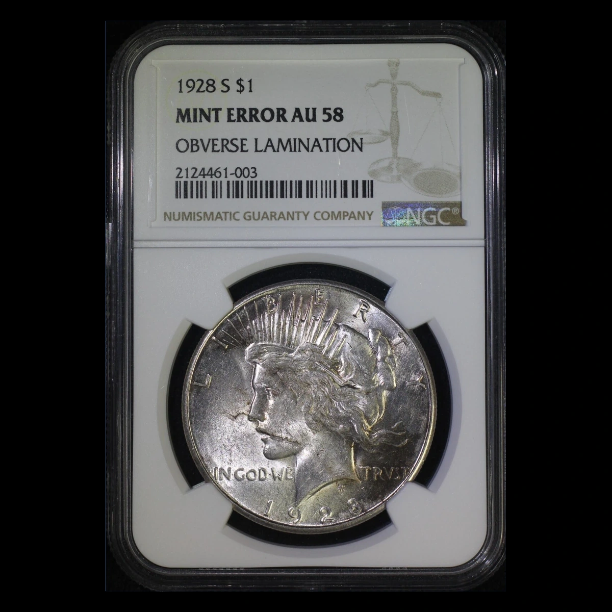 1928 Peace Dollar: Lamination