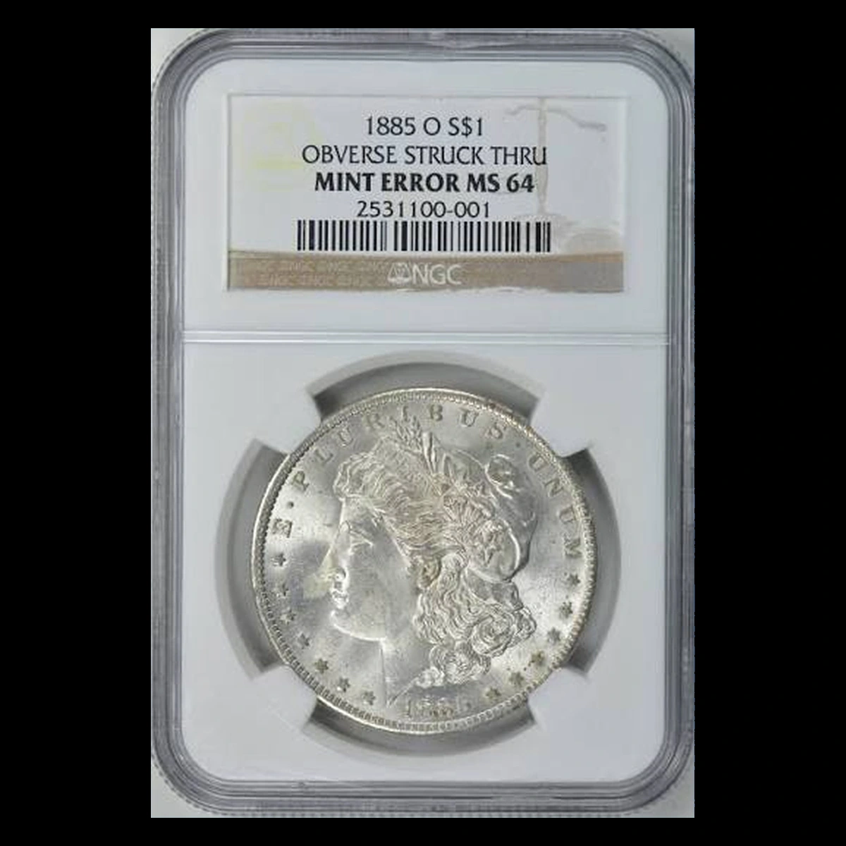 1885 Morgan Dollar: obverse strike-through